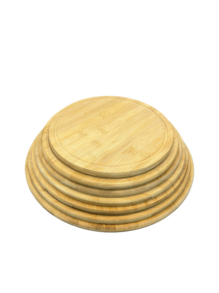 Round bamboo serving board with juice groove and natural grain