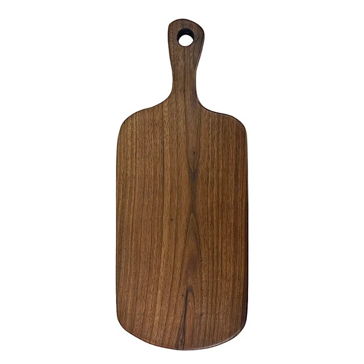 Black walnut wood cutting board with ergonomic handle and natural grain