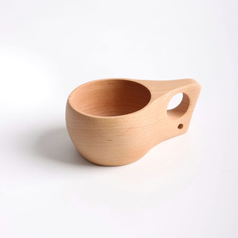 Handcrafted beech wood kuksa cup with finger hole and natural wood grain